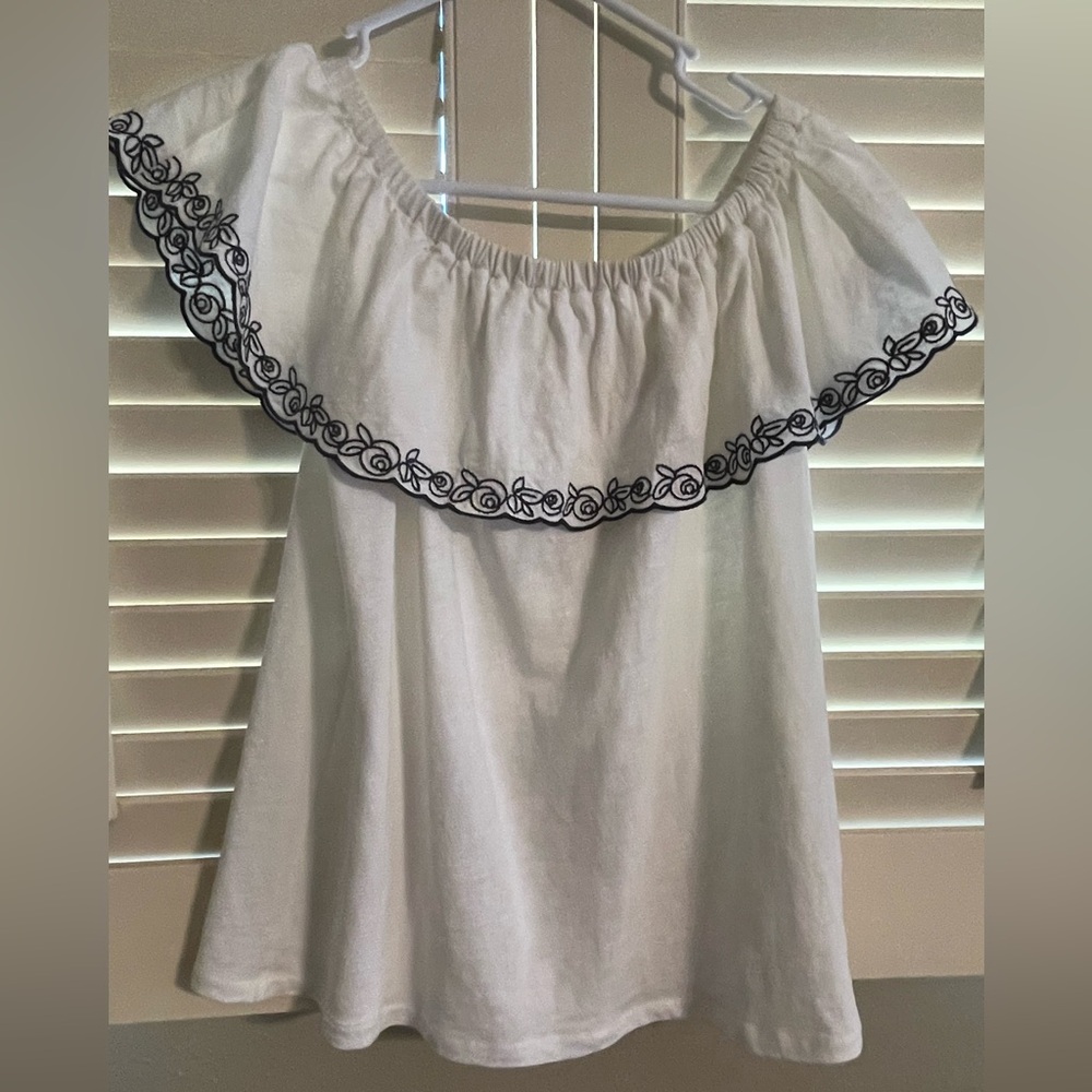 J. Crew peasant blouse worn off or on shoulder. Soft fabric, navy trim. Size S